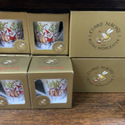 A collection of boxed Claire Mackie for Royal Worcester Christmas ceramics. NO RESERVE