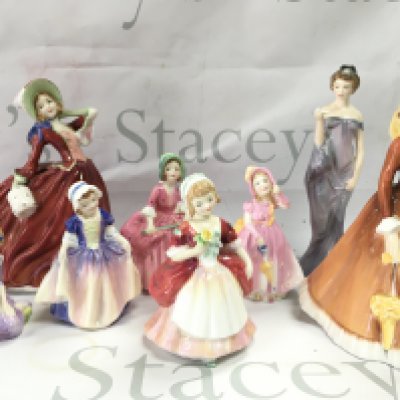 A collection of porcelain Royal Doulton figures including Julia, Harmony, Valerie , Autumn Breezes. One figure damaged . This lot cannot be posted