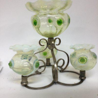 A glass and silver plated epergne inset with with four green opaque glass bowls having Art nouveau Influences. 25 cm .
