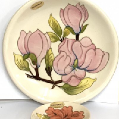 A Moorcroft Magnolia pottery 26cm plate together with a small Moorcroft dish 11.5cm