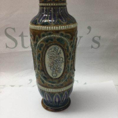 A Doulton Lambeth vase. Decorated with flowers and foilage by Bessie Youat , 25 cm .
