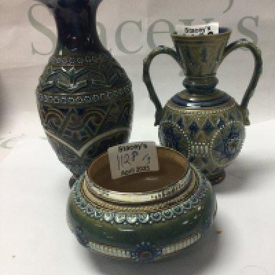 Three pieces of Doulton Lambeth stone ware including twin handle vase By Eliza Simmance a small bowl by Emily Partington.and one other vase