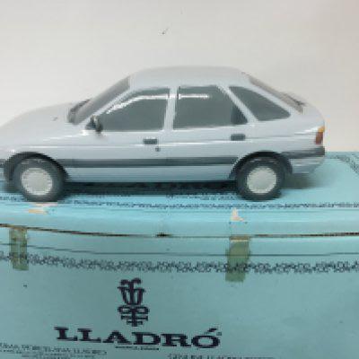 A Lladro Model of a 1990 Ford Escort car with box no damage.