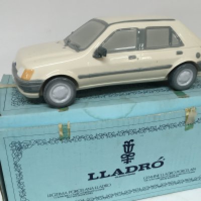 A Lladro model of a 1989 Ford Fiesta. With box no damage.