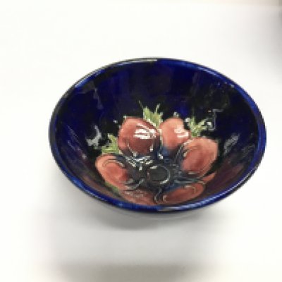 A small boxed moorcroft bowl. 9cm diameter.