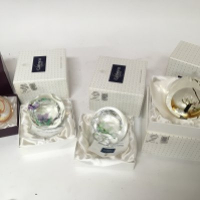 A collection of six boxed Caithness paperweights including Limited editions Japanese tea Ceremony 82/100 Japanese Ikebana 78/100 three country craft paperweights and ruby boxed Ribbons paperweight (6)