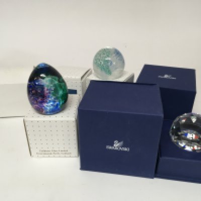 Two boxed Swarovski paperweights and four Caithness paperweights Lace Tapestry Fortune feathers SB and Weaver (6)