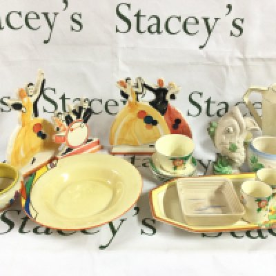 A collection of ceramics including past times Art Deco style jazz figures, Clarice Cliff fish vase, Frinton saucers , Clarice dish and bowl. This lot cannot be posted