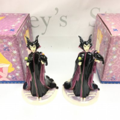 Two boxed Royal Doulton sleeping beauty figurines.