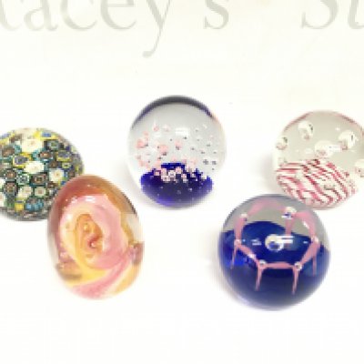 5 various paperweights including three Caithness examples.