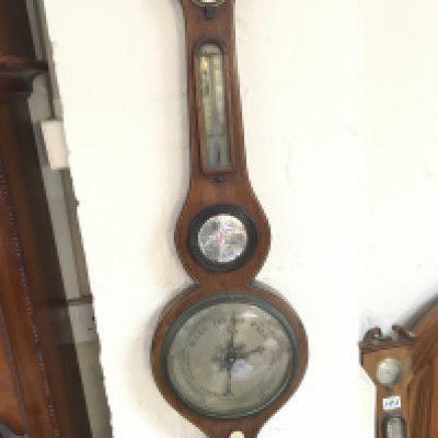 A Late George III mahogany barometer with a boxwood and ebony inlaid edge some restoration required sold without reserve. NO RESERVE