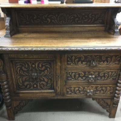 A late Victorian oak carved gothic style sideboard , dimensions 136x60x130cm