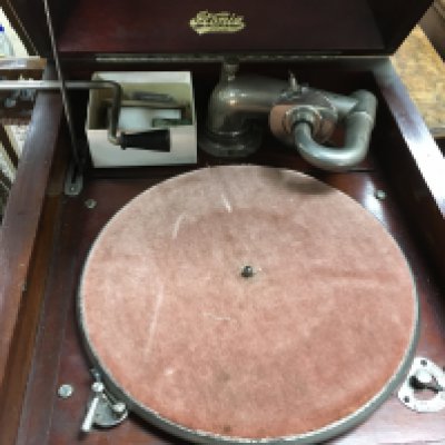 A mahogany Standing gramophone together with needle tins and records. NO RESERVE
