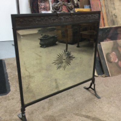 A 1930s glass mirror fire screen, 73cm tall 62cm wide