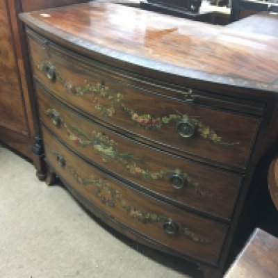 A Quality late George III hand painted bow fronted chest of drawers with a brushing slide on swept bracket feet. Length 42cm