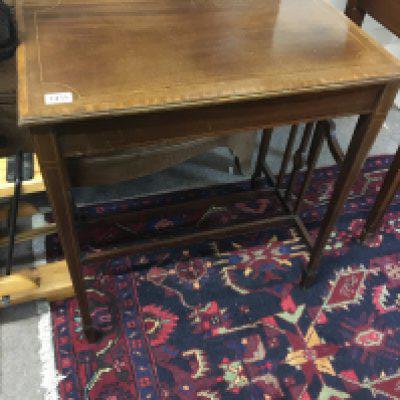 A satinwood and cross-banded occasional table the rectangular top on square legs united by stretches. 70x45cm No Reserve