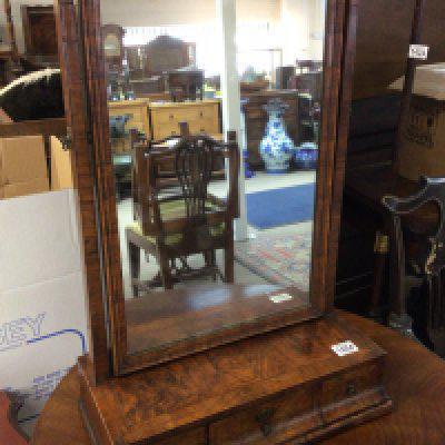 A fine George II figured walnut with fine feather banding table top dressing mirror with three drawers. Height 67cm