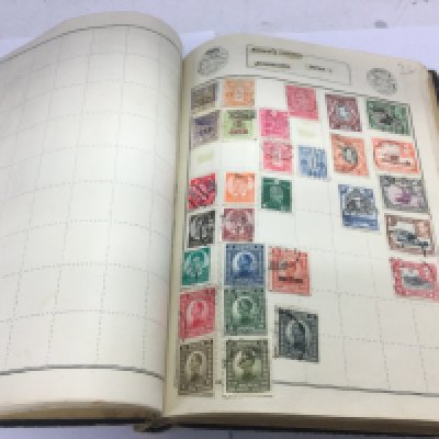 A circa 1940s/50s stamp album of world stamps. Shipping category A. NO RESERVE