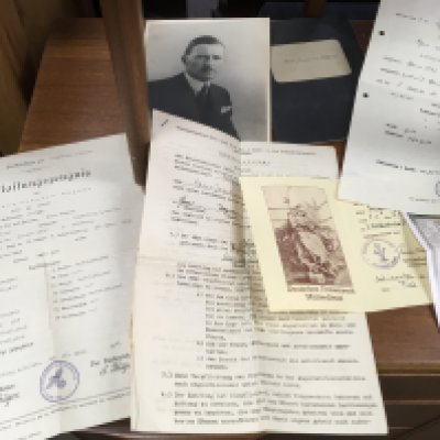 A selection of WW1 and WW2 military paperwork.