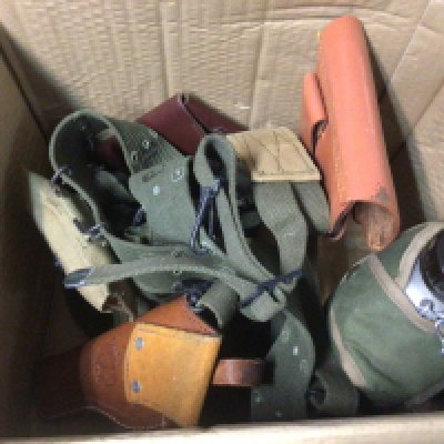 A box containing military webbing a military wooden box with liner and non military leather pistol holsters and other oddments.- NO RESERVE
