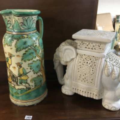 A ceramic elephant seat, a large continental ceramic jug and a wall plaque decorated with sailing ships.NO RESERVE
