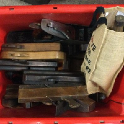 A collection of vintage woodworking tools and planes including a steel Stanley plane, metal Stewart Spiers plane and 3 metal Stanley router and various wooden planes. This lot cannot be posted