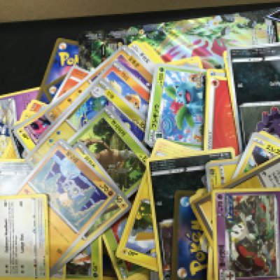 Collection of Pokemon cards including loose cards and a binder , some Korean and Japanese cards. Postage category B