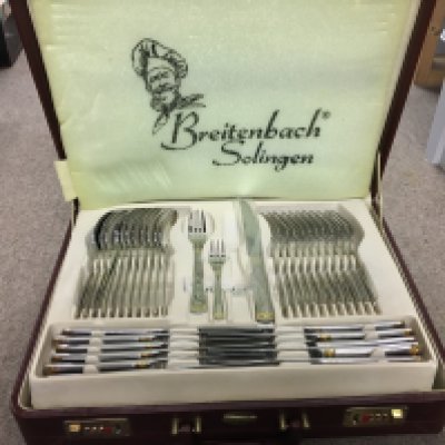 Cased Breitenbach Solingen stainless steel cutlery canteen containing forks, spoons, knives etc. postage category c