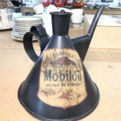 A vintage unusual shaped oil can possibly used to add oil to the pistons in the S.U carbs Mobil oil label . 18cm tall postage cat B