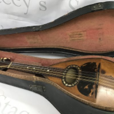 An Italian mandolin , maker E. Pedrazzoli. Total length 60cm. Postage category C