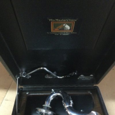 A HMV table top gramophone.