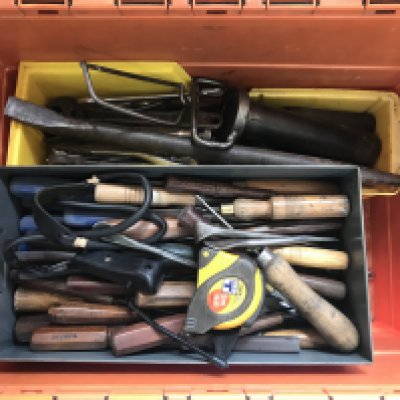 Four box containing various tools .