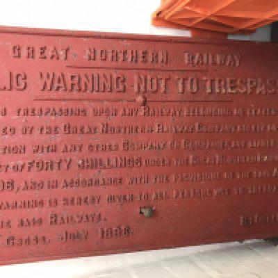 A cast iron great Northern railway sign Public warning not to trespass . 40 cm x 70 cm .