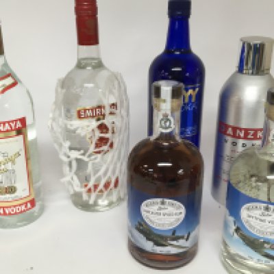 Two bottles of Wilkinson spirits Spitfire Vodka and Lancaster Spiced Rum and four other bottles of Vodka