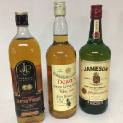 Three bottles of Whisky Irish Jameson JPS Scotch whisky and a bottle of Dewars all one litre bottles (3)