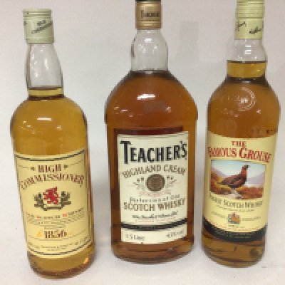 A 1.5 litre bottle of Teachers Scotch Whisky and bottle of High Commissioner and a bottle of The famous Grouse (3)