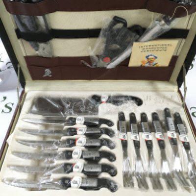 A Soligen canteen case of knifes and steak knives . Postage category C