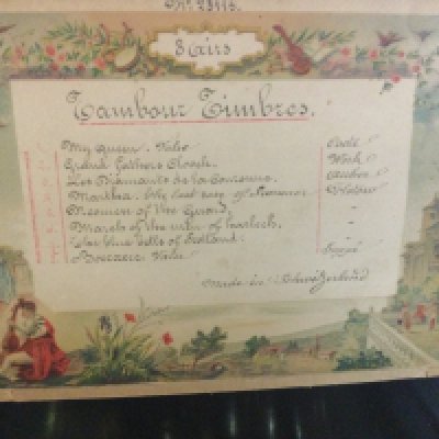 A Victorian rosewood musical box 8 Airs .striking with drum and bells .