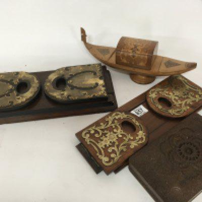 Two pairs of Victorian walnut and brass mounted extending book ends an Italian cigarette box and a profusely carved Indonesian cigarette box (4)