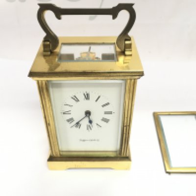 A Mappin and web carriage clock which winds and runs. Door is off.