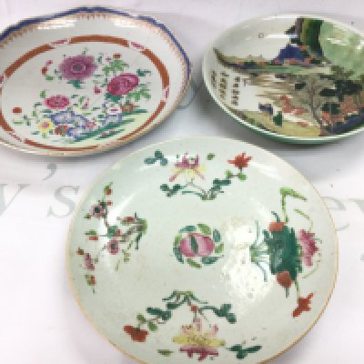 Chinese dishes including Famille Rose (restored and chips in both dishes) and Famille Verte (no obvious large damage or restoration, some flaws in the glaze). This lot cannot be posted