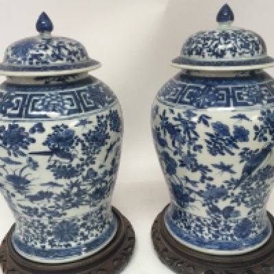 A Pair of 19th century Chinese Export Porcelain blue and white vases decorated with birds flowers and foliage. No obvious damage or restoration height 36cm