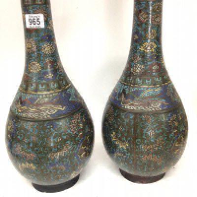 A pair of large 19th century Chinese bronze and cloisonn̩ bottle vases with a floral pattern and signed basis height 48cm