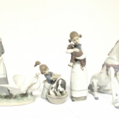A Collection of boxed Lladro figures including Playful unicorn , girl with lamb, 12 to 24cm tall. This lot cannot be posted