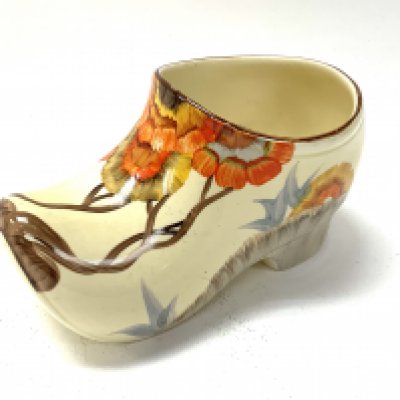 A Clarice Cliff Rodanth pattern clog. 14cm. (D) no viable damage or restoration.