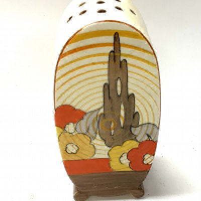 A Clarice Cliff Bonjour design sugar sifter with Capri pattern. 12.5cm, no damage or restoration. (D) (unmarked).