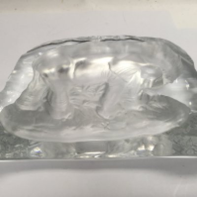 An elephant fruit bowl and paper weight with another glass cut fruit bowl.