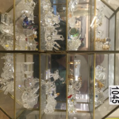 A Collection of six small display cabinets containing thimbles and crystals ornaments.