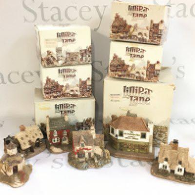 A Collection of boxed Lilliput lane resin cottage models. This lot cannot be posted