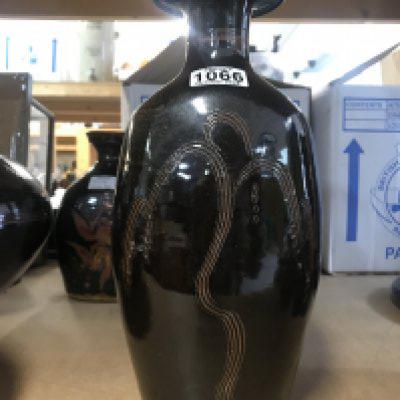 A David Leach Stoneware vase. Resist decorated in Tenmoku glaze. 32cm height